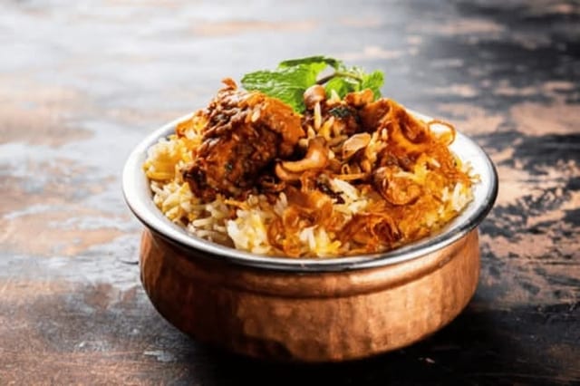 Mutton Dum Biryani.